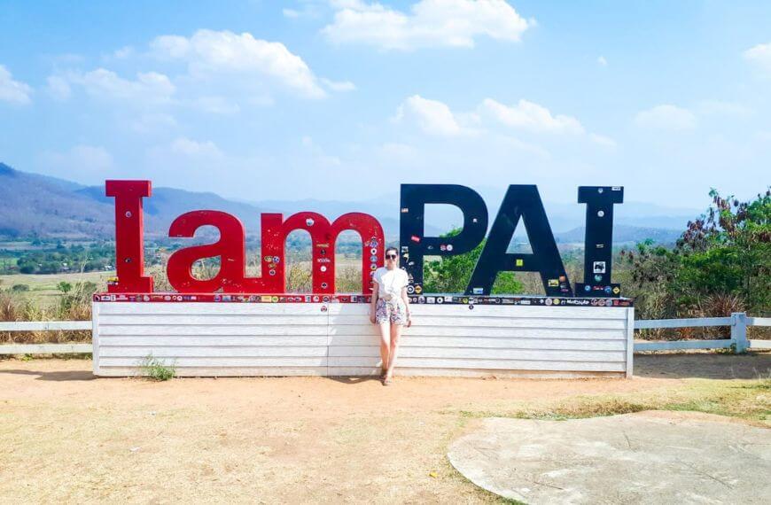 me infront of the "i am pai" sign a popular stop on the southeast asia route as backpackers