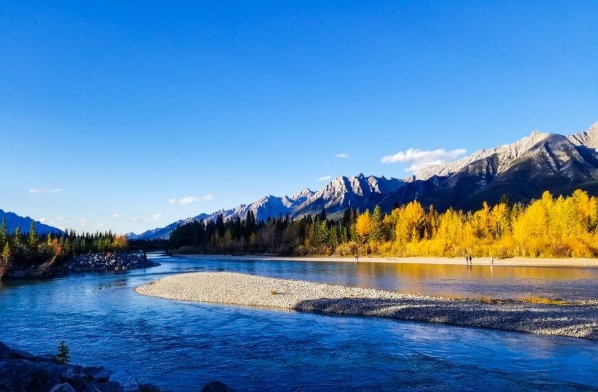 mountains surrounding the bow river from the west side of the loop trail