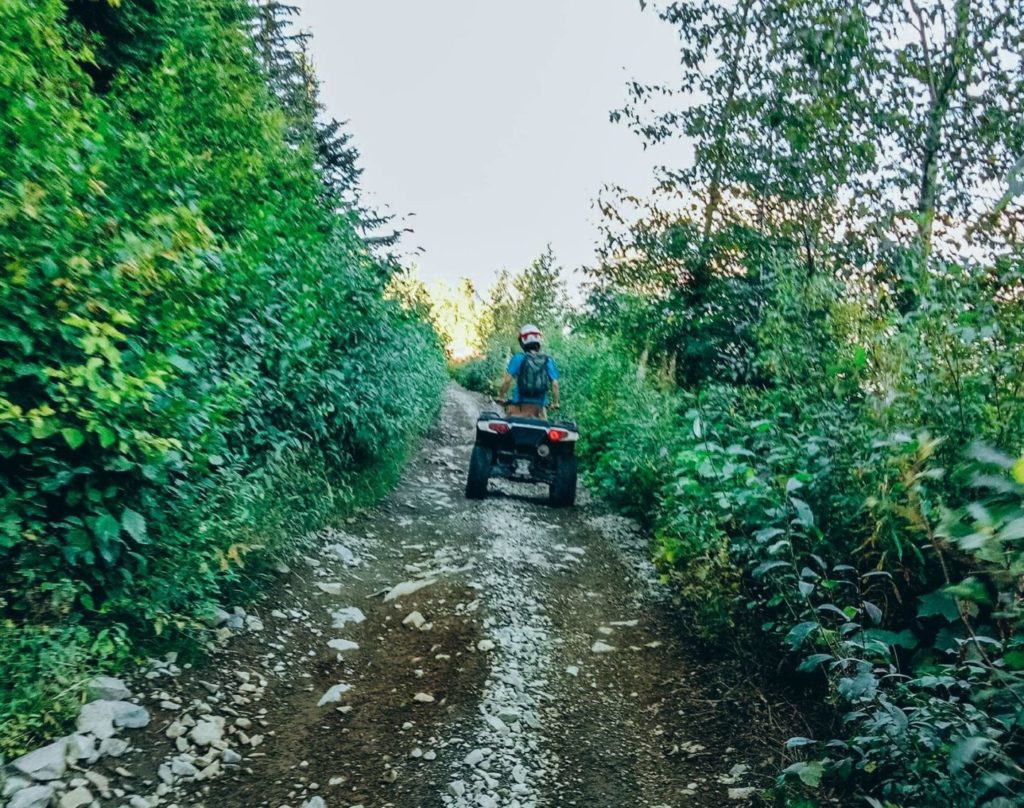 our tour guide driving the atv in our whistler excursion