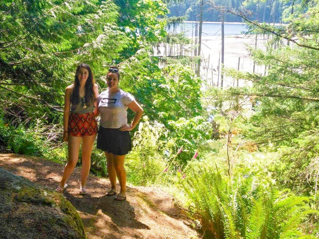 my friend and i standing at a viewpoint in British Columbia