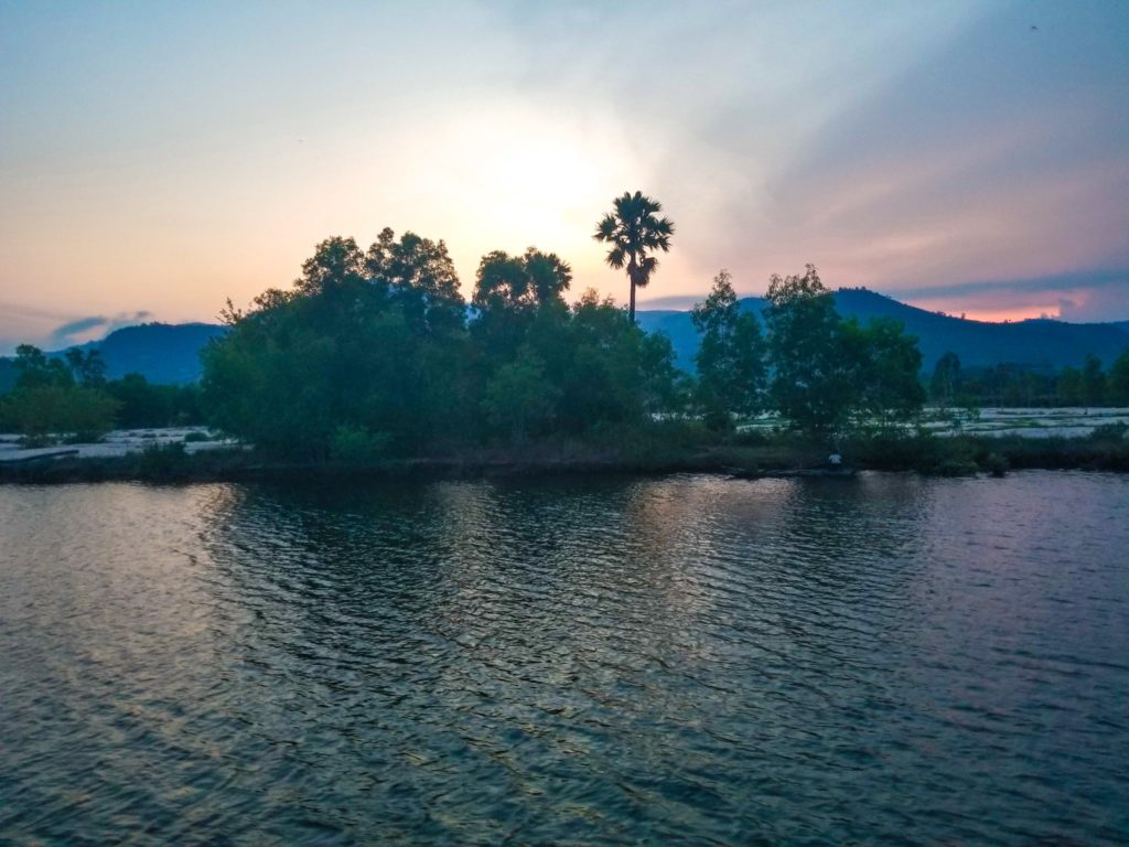 sunset over cambodian river