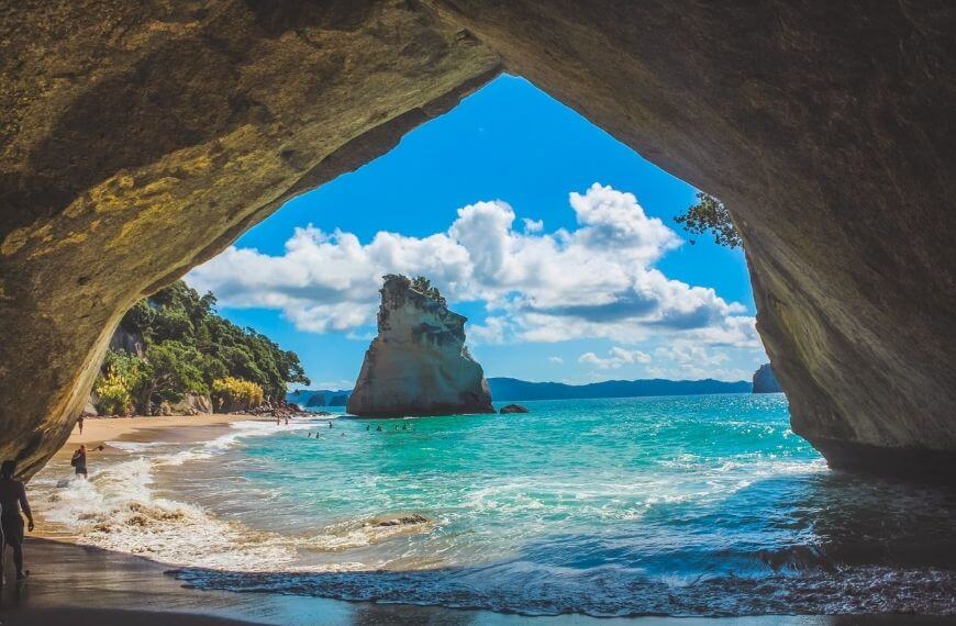 cathedral cove cave with low tide and rock formations