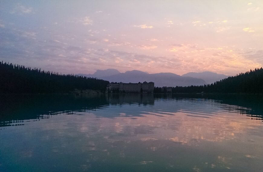 sunrise over the fairmont hotel in lake louise