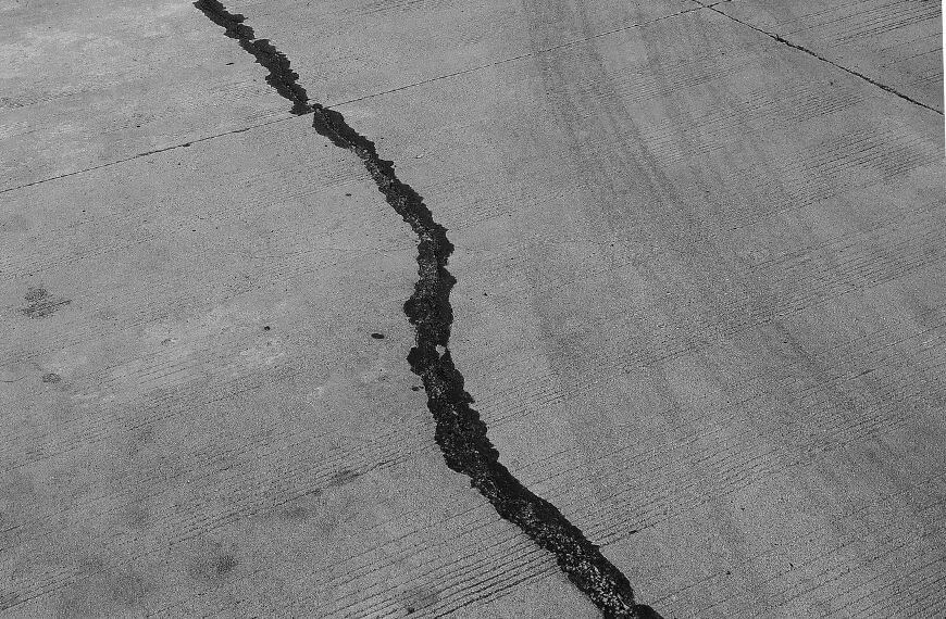 earthquake cracks in the cement - pros and cons to living in new zealand are the earthquakes