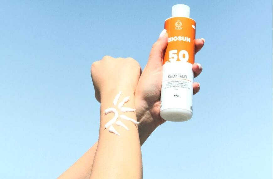 sunscreen on a person's arm 