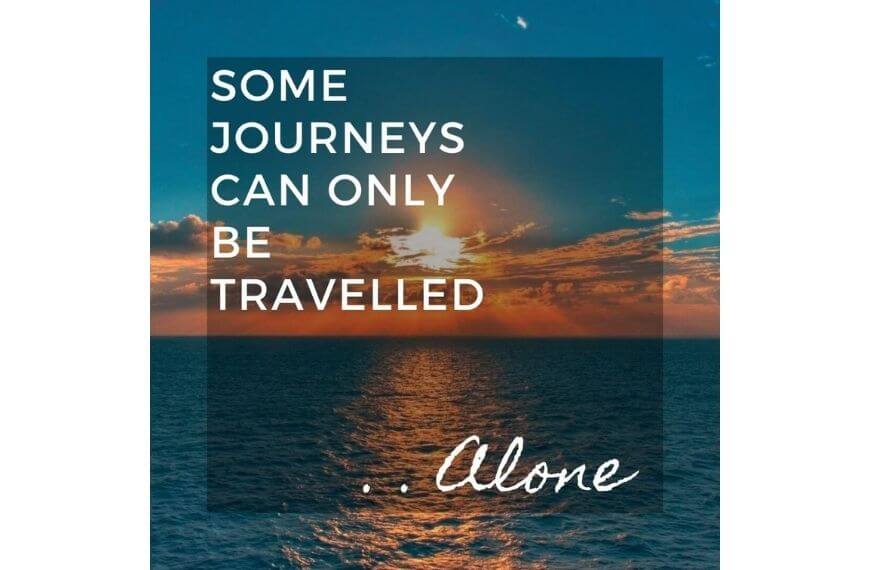 solo travel quotes on an ocean sunset background