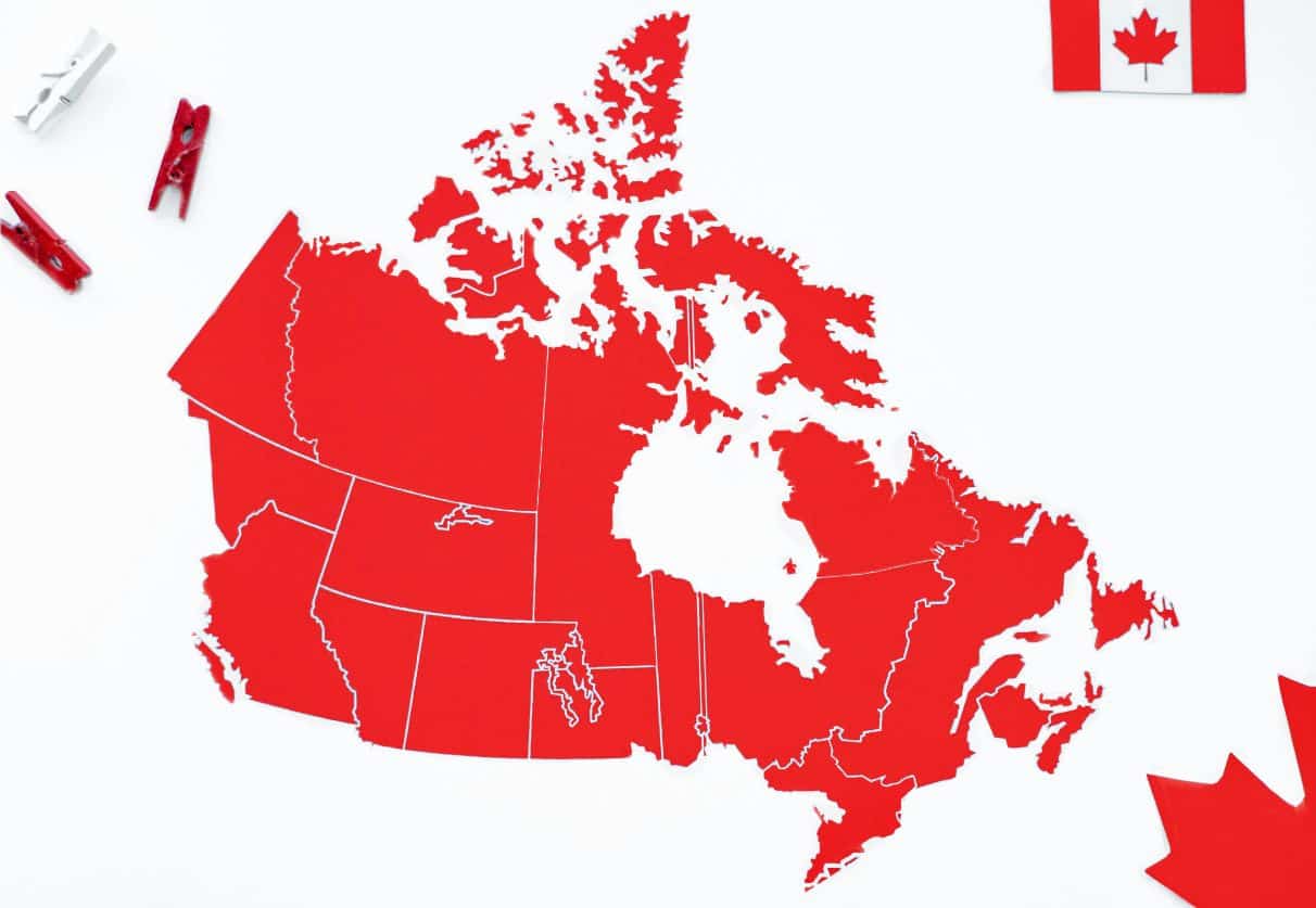 Map of Canada for the working holiday visa program with maple leaf and flag